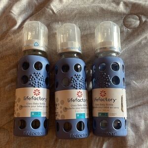 Brand new (still sealed) glass baby bottles